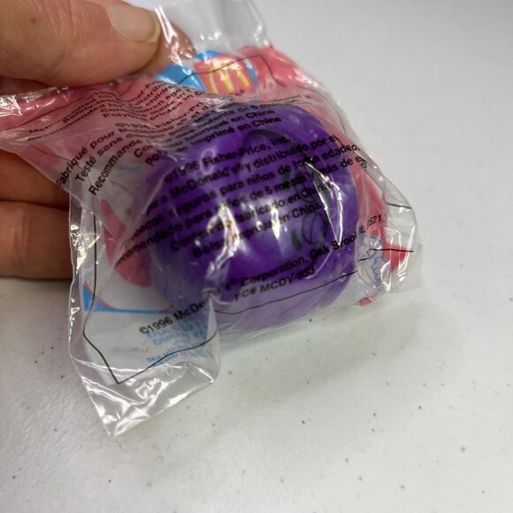 Vintage Fisher Price Purple Ball Rattle McDonalds Toy, Sealed Package 1996 - Picture 2 of 5